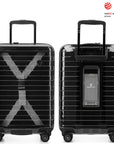 An image of a black transparent luggage with a space for a portable charger.